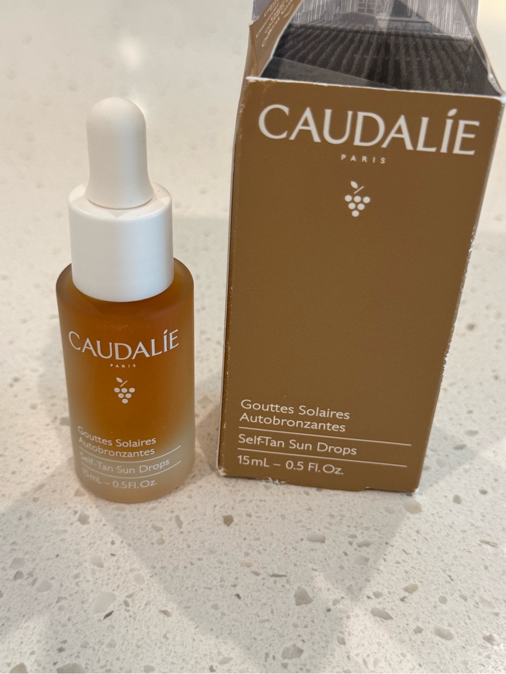 Caudalie Bronze Bottle and Box - White Dropper